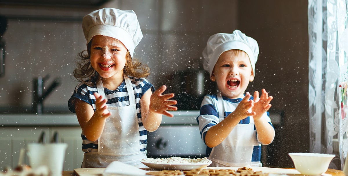 Kids making breakfast for mom
